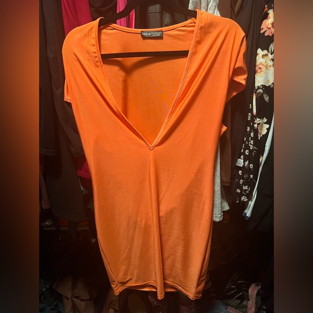 Size large orange dress.